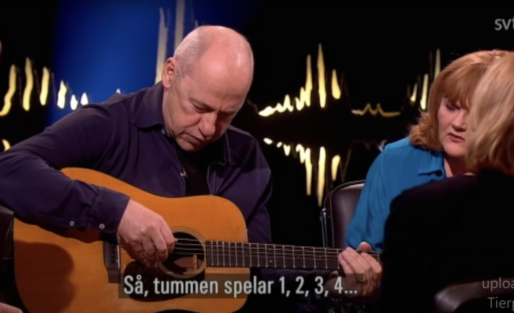 Mark Knopfler Shows How to Play His Fingerpicking Guitar Style Open