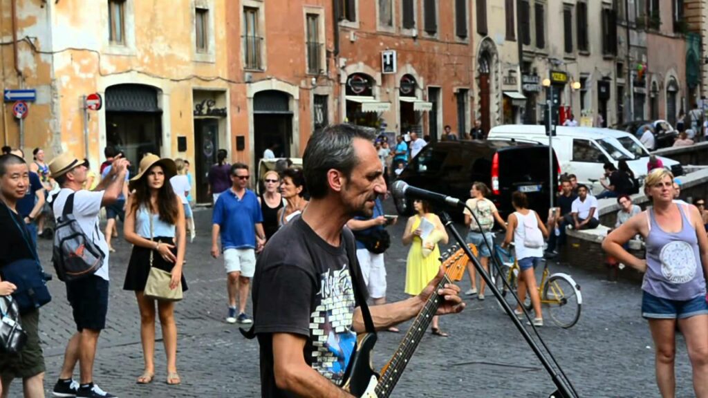A Street Musician Plays Pink Floyd’s “Time” in Front of the 1,900-Year-Old Pantheon in Rome