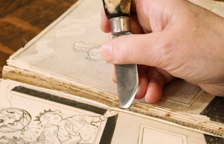 Watch a 106-Year-Old Wizard of Oz Book Get Magically Restored … By Cutting the Book’s Spine, Washing Pages & Recoloring Illustrations