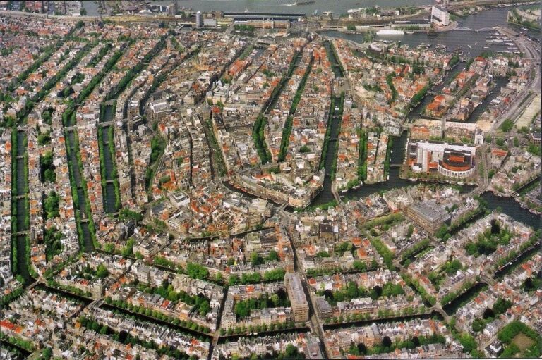 The Genius Urban Design of Amsterdam: Canals, Dams & Leaning Houses