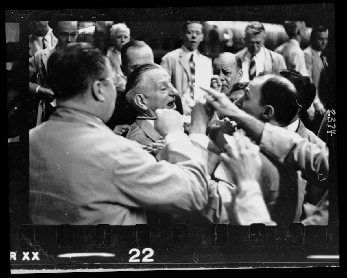 Men working the floor at the Chicago Board of Trade